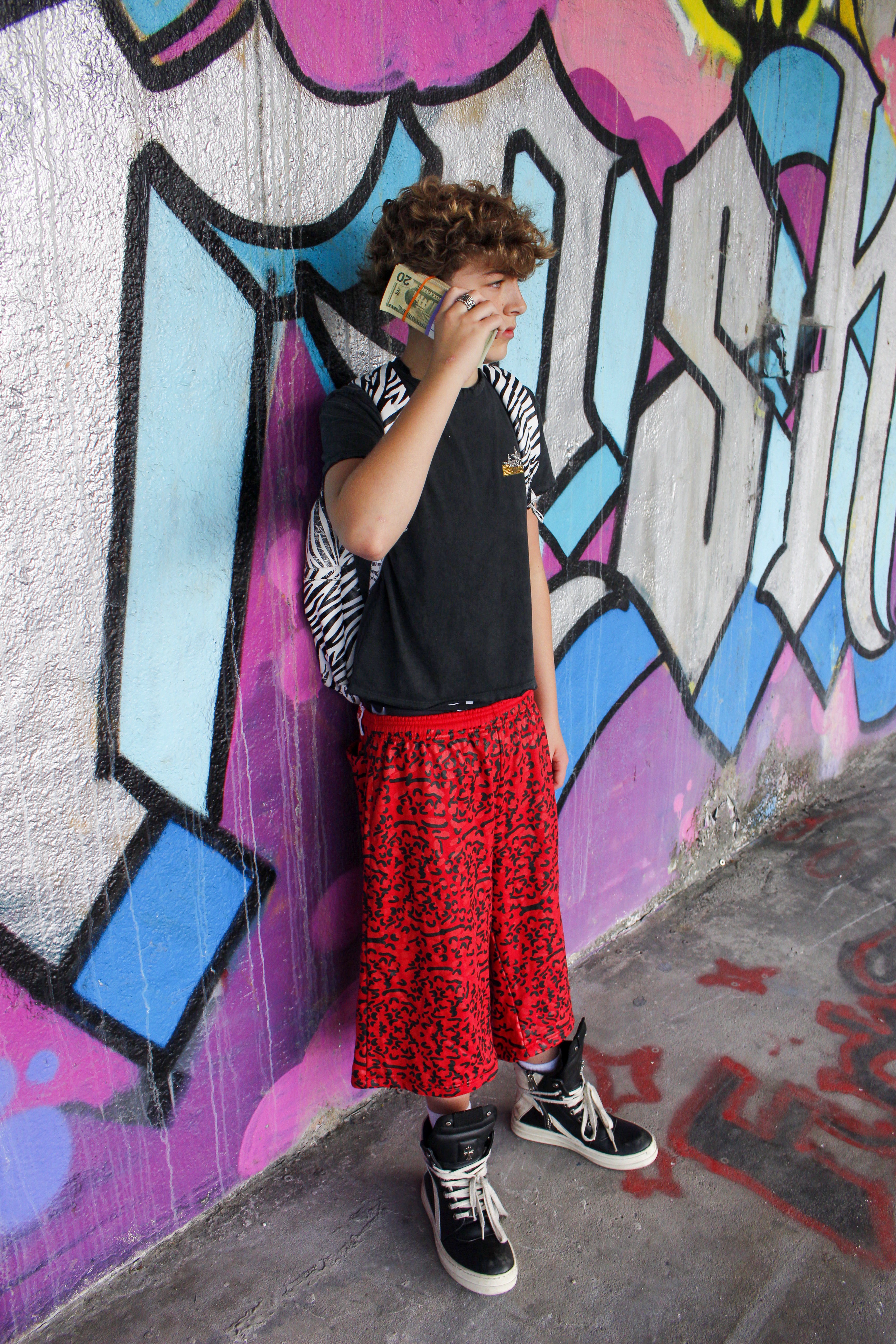 RED LEOPARD SWEATSHORTS